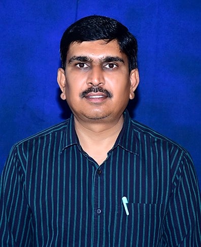 Portrait of Dr. S M Umesh, Secretary of Manjushree Education Trust